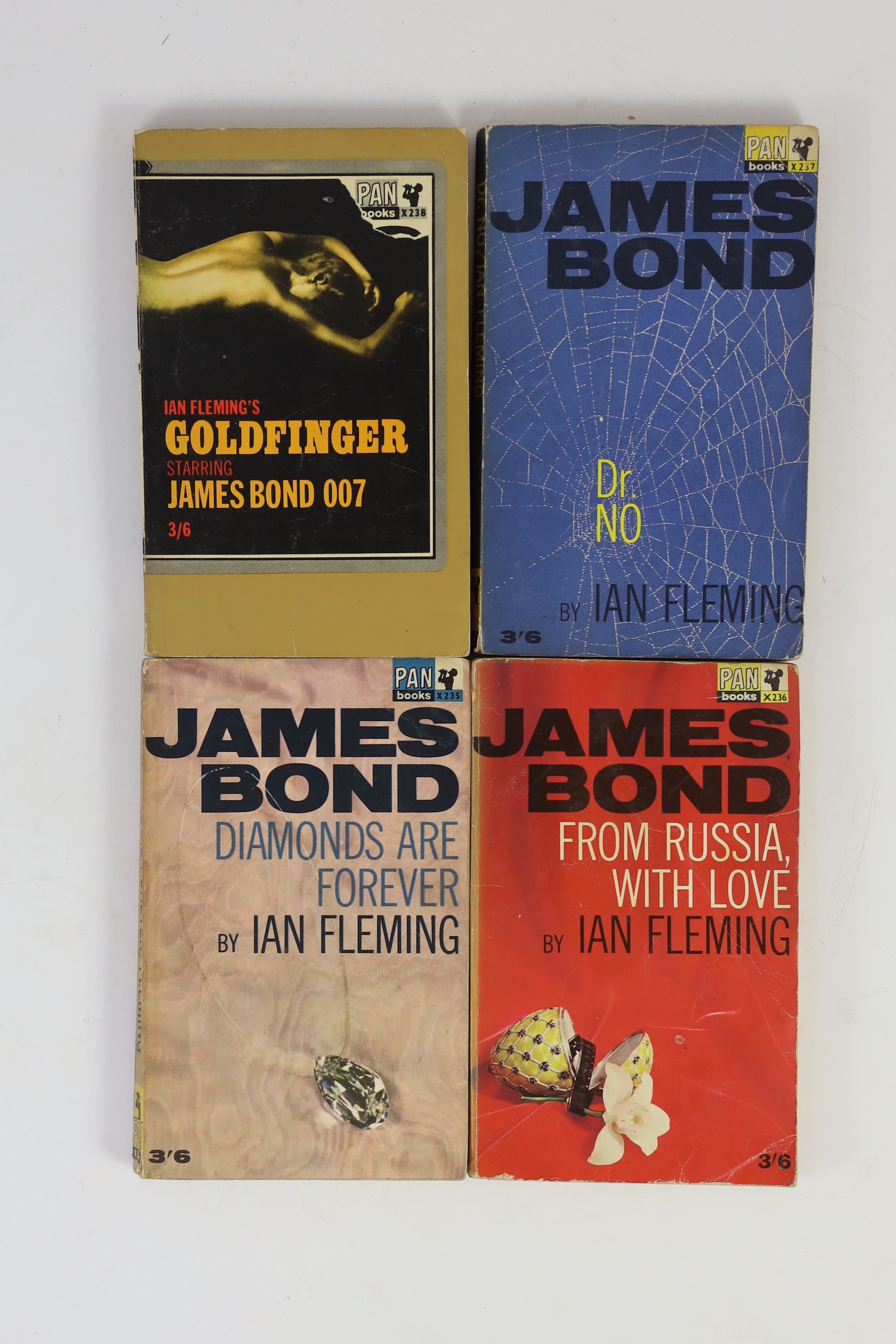 Fleming, Ian - 12 paperbacks, published by Pan Books, consisting - Casino Royale, 1964; Live and Let Die, 1965; Moonraker, 1964; Diamonds Are Forever, 1965; From Russia with Love, 1965; Dr. No, 1964; Goldfinger, 1964; Fo